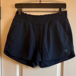 Carve Designs Navy Blue Athletic Shorts with Elastic Waistband and Drawstrings.